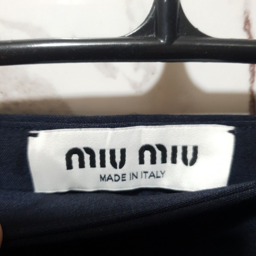 MIU MIU WOOL MINI SKIRT (Category: Skirts) located in Caloocan City. Submitted by narvaezlorven (Listing ID 1462865400, Image 3). Description: NO ISSUE GOOD AS NEW CONDITION CRISPY CONDITION WAIST 26 TAYTAY RIZAL LOC.