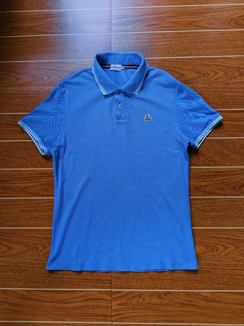 Moncler Polo Small Logo Patch Striped Collar&Sleeve (Light Blue) (Category: Tshirts & Polo Shirts ) located in Davao. Submitted by raymnd89 (Listing ID 1462818475, Image 2). Description: Moncler Polo Small Logo Patch Striped Collar&Sleeve (Light Blue) S: Medium on tag, can fit Medium to semi Large L: 28 W: 19.5 Color rate: 10/10 Excellent condition Issue: cut wash tag only.