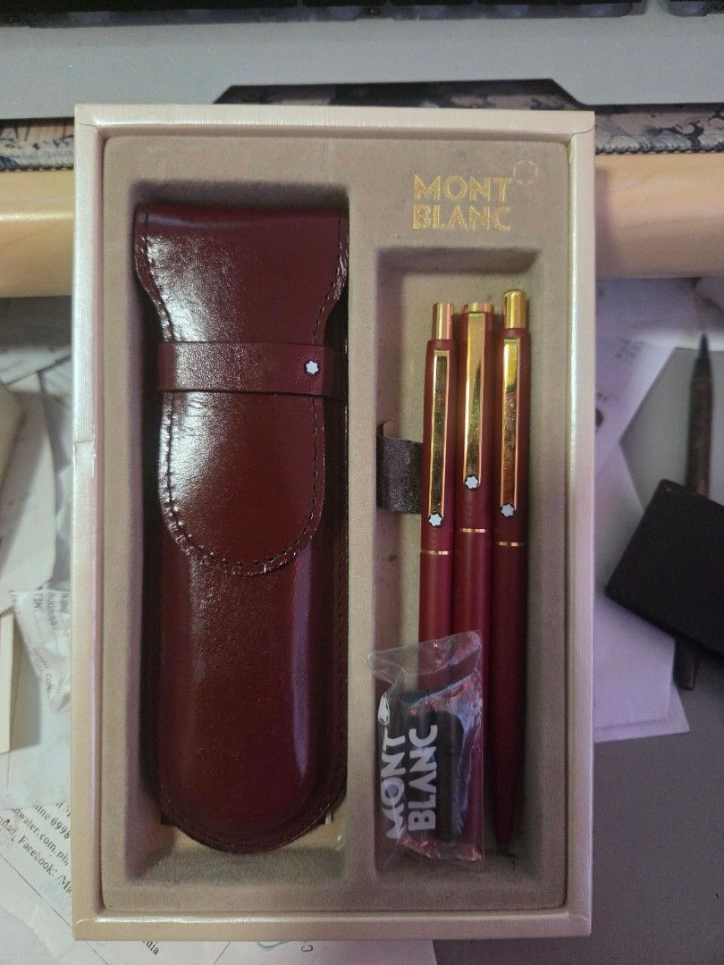 Mont Blanc Pen Set with Leather Pouch (Category: Stationery & School Supplies) located in Paranaque City. Submitted by antik-antik (Listing ID 1462704907, Image 2). Description: - Authentic Mont Blanc Pen Set - Includes three pens and a matching deep red leather pouch - Pens feature a luxurious deep red finish with elegant gold accents - Mont Blanc logo clearly visible on each pen - Comes in the original Mont Blanc presentation box - Ideal gift f