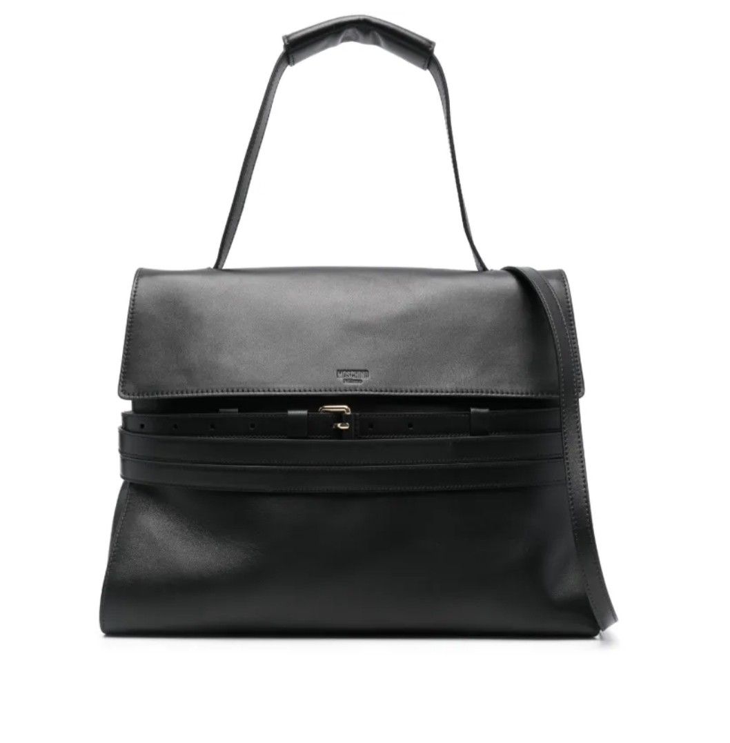 Moschino Tie Me bag Medium (Category: Luxury Bags & Wallets) located in Paranaque City. Submitted by ddddsy (Listing ID 1462838188, Image 1). Description: Nappa bag, in medium size and with a deliberately soft construction, making it surprisingly light. A distinctive feature is the fully detachable decorative belt that wraps around the bag's body. The handle has matching leather protection, and a practical rear pocket allows you to keep essential