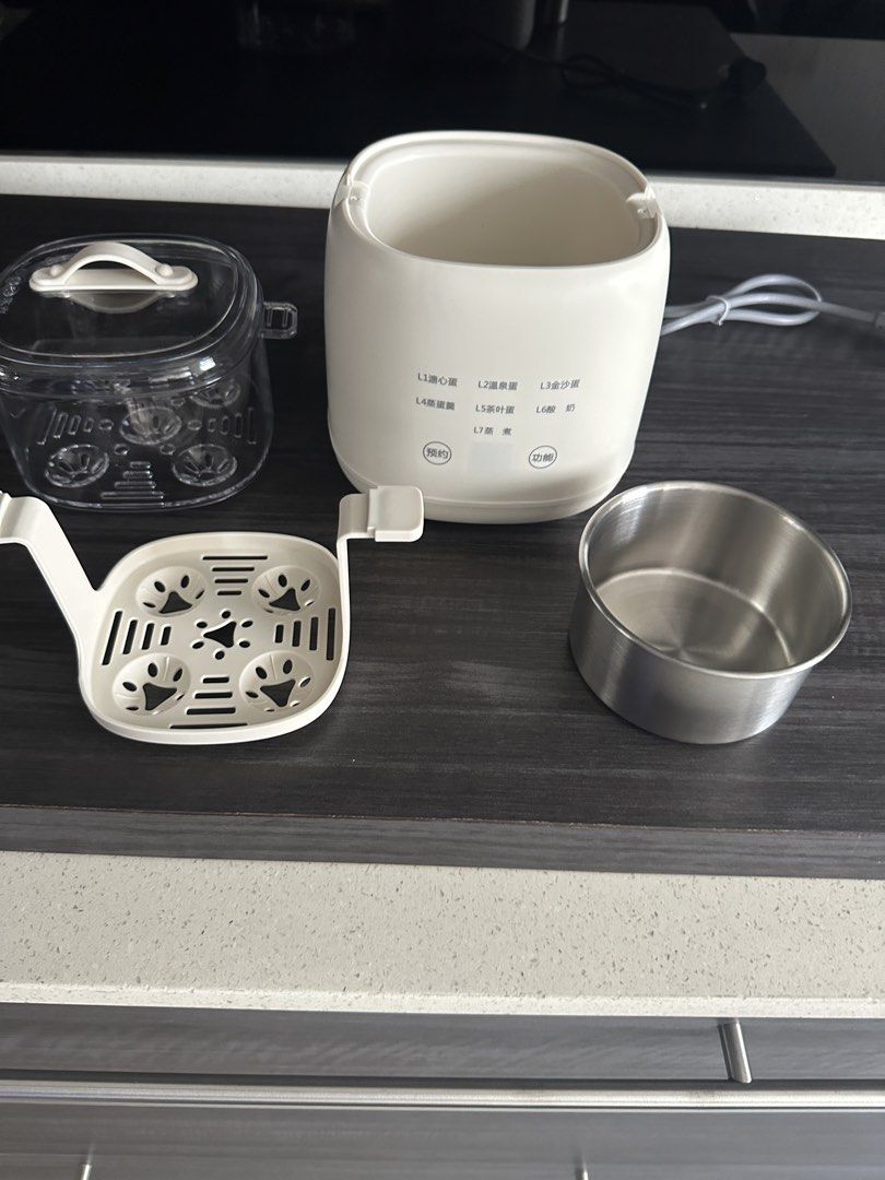 Multi-function Steamer with 7 Modes (Category: Irons & Steamers) located in Singapore. Submitted by fun_collection (Listing ID 1462692887, Image 4). Description: - Multi-function steamer with 7 cooking modes - Perfect for steamed eggs and yogurt - Smart timing function for convenience - Dry-burn protection for safety - Transparent lid to monitor cooking - Ideal for healthy eating - Comes with steaming rack and small stainless steel bowl.