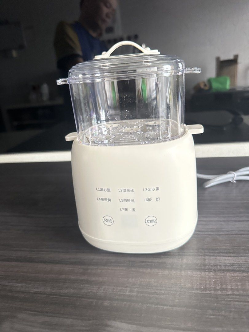 Multi-function Steamer with 7 Modes (Category: Irons & Steamers) located in Singapore. Submitted by fun_collection (Listing ID 1462692887, Image 5). Description: - Multi-function steamer with 7 cooking modes - Perfect for steamed eggs and yogurt - Smart timing function for convenience - Dry-burn protection for safety - Transparent lid to monitor cooking - Ideal for healthy eating - Comes with steaming rack and small stainless steel bowl.