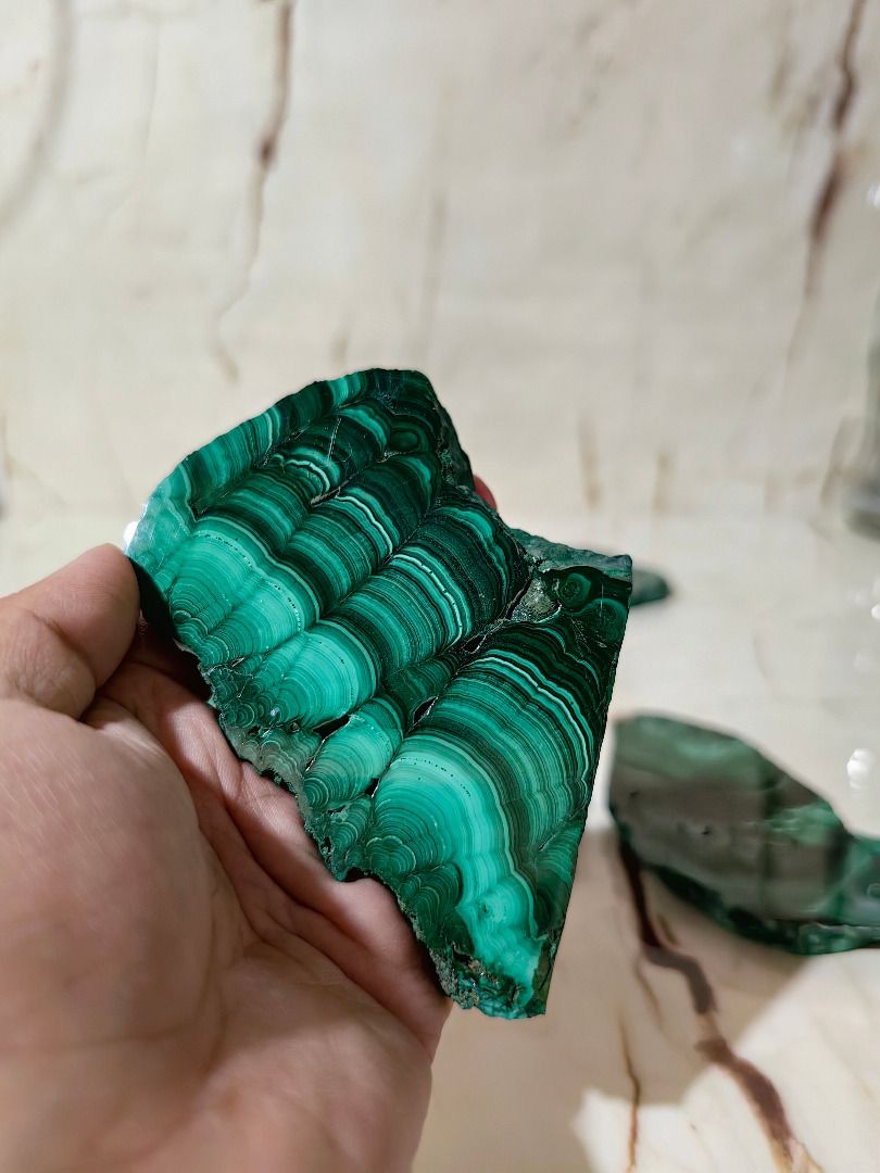Natural Malachite Slices for Decor or Crafting (Category: Other Home Decor) located in Tarlac. Submitted by jeremiah.curator.2026 (Listing ID 1462687134, Image 3). Description: Malachite Stone Slabs are truly one-of-a-kind—each piece showcasing its own distinctive banding, color, weight, and origin. Because genuine Malachite is exceptionally rare, pricing reflects the unique characteristics and provenance of each slab. 💚 The price ranges from PH