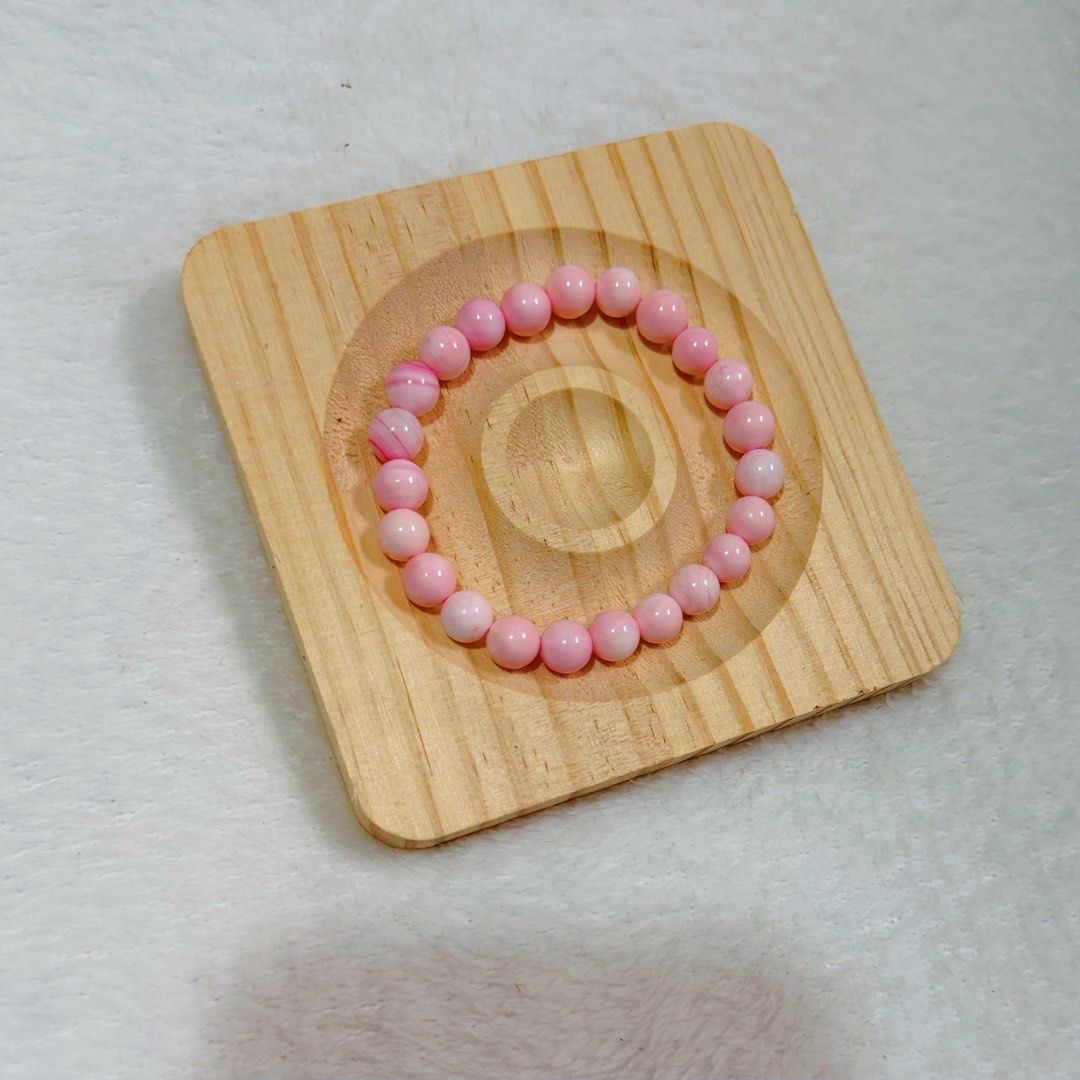 Natural Pink Conch Shell Bracelet 8mm with Certificate (Category: Bracelets) located in Cavite. Submitted by heirlooms_and_treasures (Listing ID 1462760595, Image 3). Description: Perfect for everyday wear, stacking, or adding a soft pop of color to your outfit! 💕 What’s Included: 1x Natural Pink Conch Shell Bracelet 1x Jewelry Identification Certificate Note: Since these are genuine natural stones, each bead features unique, subtle natural incl