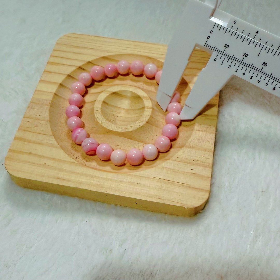 Natural Pink Conch Shell Bracelet 8mm with Certificate (Category: Bracelets) located in Cavite. Submitted by heirlooms_and_treasures (Listing ID 1462760595, Image 2). Description: Perfect for everyday wear, stacking, or adding a soft pop of color to your outfit! 💕 What’s Included: 1x Natural Pink Conch Shell Bracelet 1x Jewelry Identification Certificate Note: Since these are genuine natural stones, each bead features unique, subtle natural incl