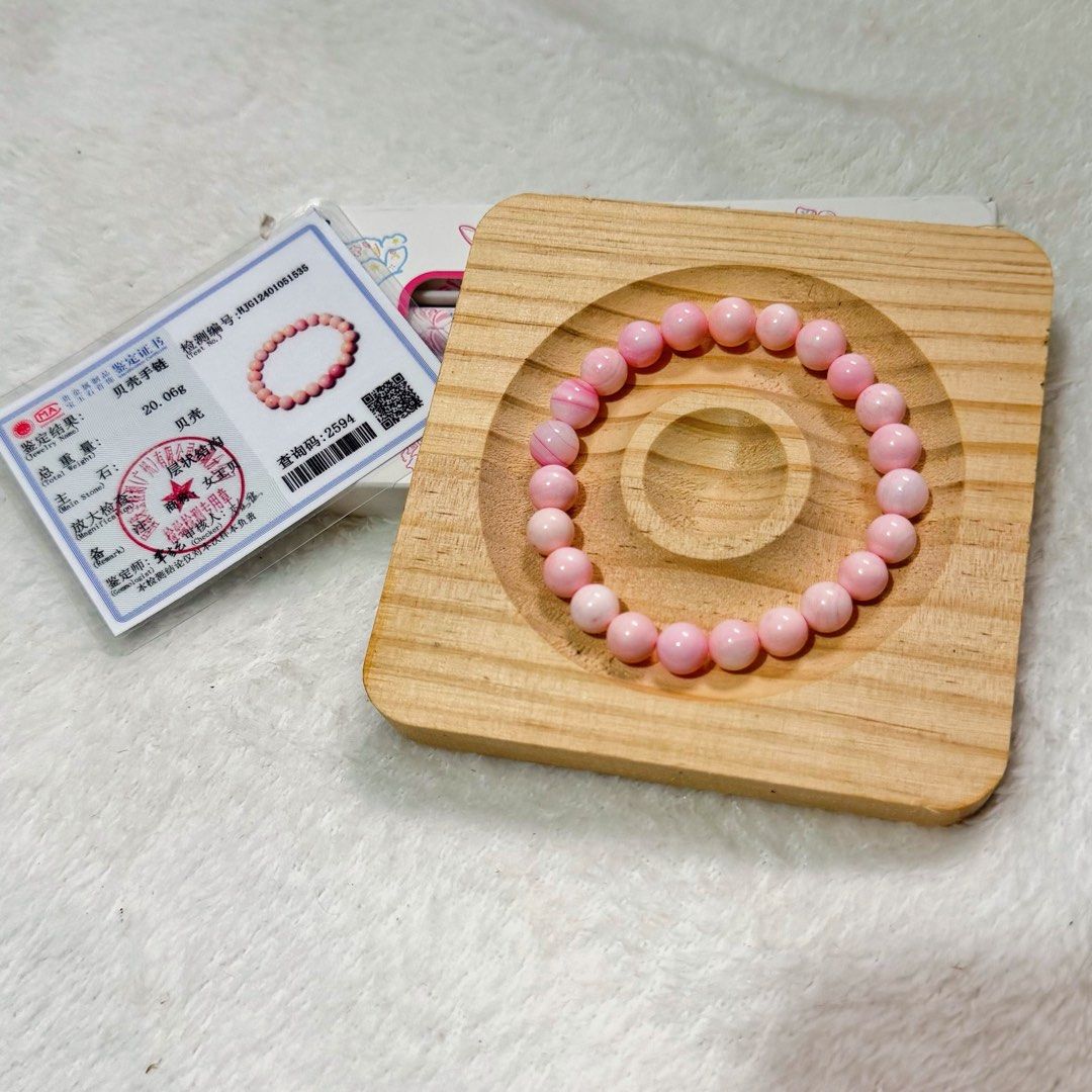 Natural Pink Conch Shell Bracelet 8mm with Certificate (Category: Bracelets) located in Cavite. Submitted by heirlooms_and_treasures (Listing ID 1462760595, Image 1). Description: Perfect for everyday wear, stacking, or adding a soft pop of color to your outfit! 💕 What’s Included: 1x Natural Pink Conch Shell Bracelet 1x Jewelry Identification Certificate Note: Since these are genuine natural stones, each bead features unique, subtle natural incl