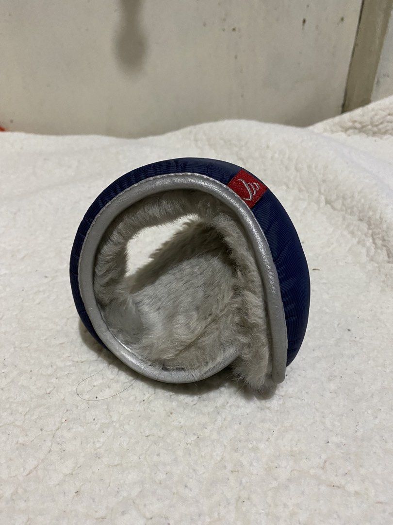 Navy Blue Faux Fur Lined Earmuffs (Category: Other Accessories) located in Manila. Submitted by resi.diaz (Listing ID 1462874059, Image 1). Description: - Unisex - Navy blue earmuffs - Soft grey faux fur lining - Silver trim detail - Folds for convenient storage - Ideal for cold weather warmth - Stylish and comfortable - Small red logo tag on the side.