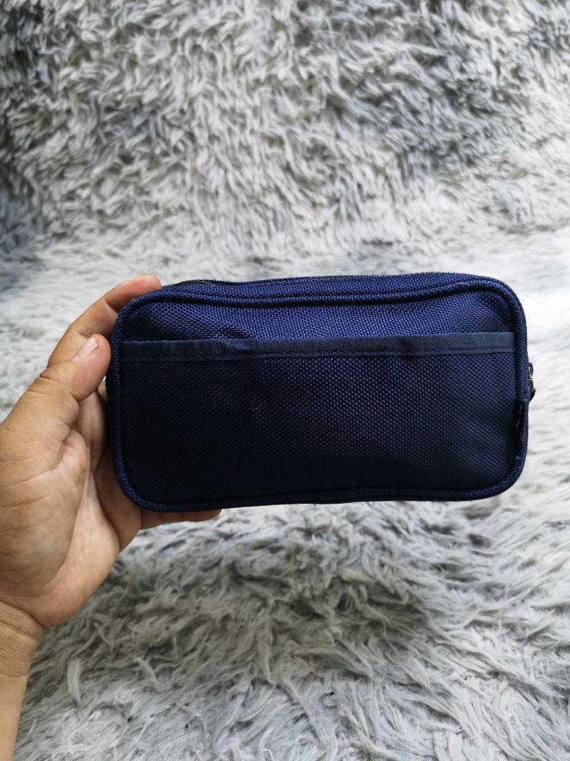 Navy Blue rectangular Zipper Closure Coin Purse (Category: Purses & Pouches) located in Santa Cruz. Submitted by jmy_surplus.2 (Listing ID 1462684318, Image 2). Description: Size ; L- 5 W - 8 Color ; Navy Blue Type ; Purse Brand ; No brand Material ; Nylon Style ; Zipper Closure Coin Purse LR 129 JMY 4 Batch #222.