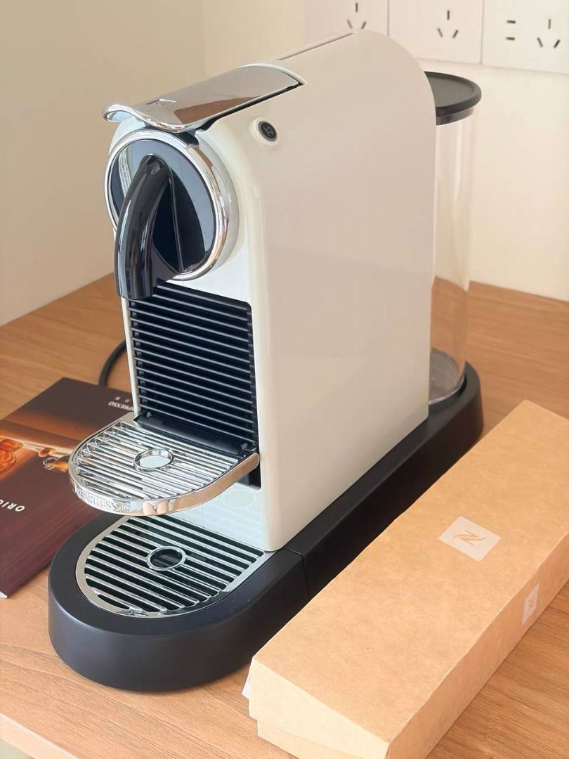 Nespresso CitiZ with box (Category: Coffee Machines & Makers) located in Makati City. Submitted by swiftwind_fd3653 (Listing ID 1462713326, Image 1). Description: - White Nespresso Essenza Mini coffee machine - Includes original box and manual - Excellent working condition - Makes great coffee quickly - Ideal for small kitchens or simple espresso needs.