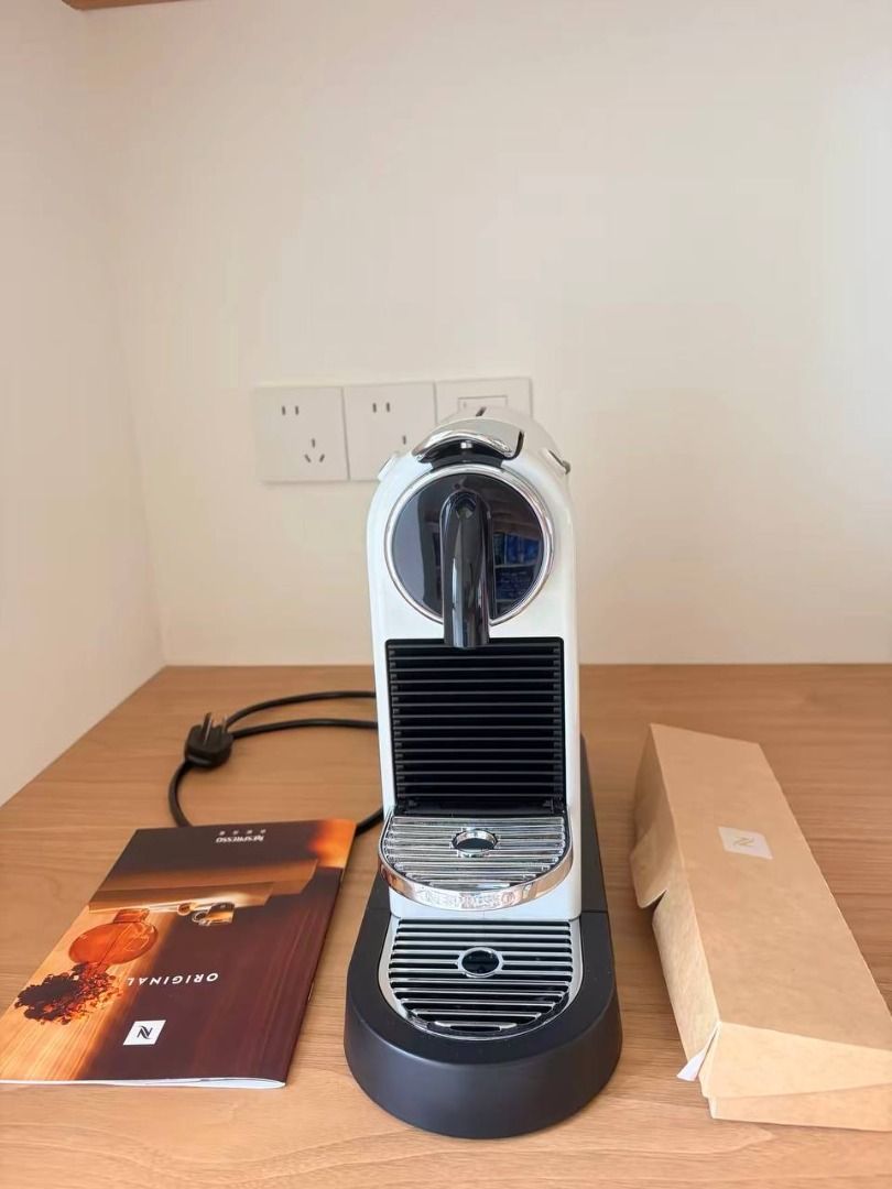 Nespresso CitiZ with box (Category: Coffee Machines & Makers) located in Makati City. Submitted by swiftwind_fd3653 (Listing ID 1462713326, Image 2). Description: - White Nespresso Essenza Mini coffee machine - Includes original box and manual - Excellent working condition - Makes great coffee quickly - Ideal for small kitchens or simple espresso needs.