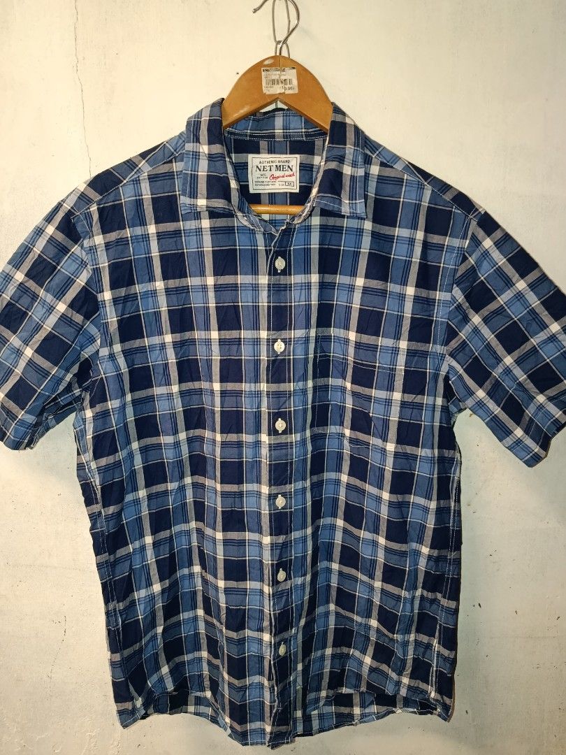 Net Men Blue Plaid Button-Up Shirt (Category: Tshirts & Polo Shirts ) located in Nabunturan. Submitted by marmitoren42236 (Listing ID 1462692719, Image 2). Description: - Authentic Net Men blue and white plaid shirt - Original wash - Button-up front with chest pocket - Size: Medium (M) - Ideal for casual outfits.