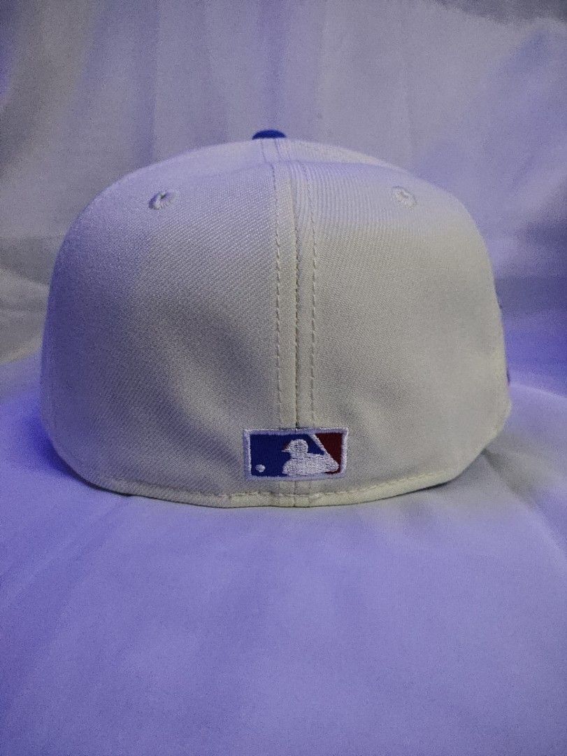 New Era LA Dodgers 59FIFTY Fitted Hat (Category: Caps & Hats) located in Manila. Submitted by vestige_collection (Listing ID 1462864143, Image 3). Description: - Brand: New Era - Model: 59FIFTY Fitted Hat - Team: LA Dodgers - Color: Cream crown with blue brim - Features: Iconic pink LA logo, side graphic, MLB logo on back - Size: 7 1/4.