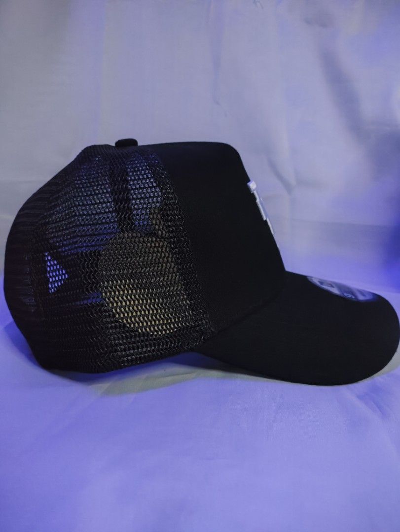 New Era LA Dodgers 9TWENTY Trucker Cap Black (Category: Caps & Hats) located in Manila. Submitted by vestige_collection (Listing ID 1462863644, Image 2). Description: - Black LA Dodgers trucker cap - New Era 9TWENTY adjustable fit - Breathable mesh back - Ideal for everyday or game days - Classic and stylish design.