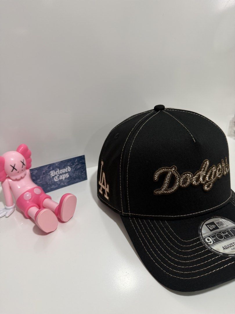New Era Los Angeles Dodgers Rope Script 9forty Aframe Snapback (Category: Caps & Hats) located in Valenzuela. Submitted by belovedcatdad (Listing ID 1462723277, Image 2). Description: - Brand New Black New Era 9Forty Cap - Features iconic embroidered Dodgers logo on the front - Adjustable strap at the back for a custom, comfortable fit - New Era branding details on the side and inside - Classic green underbrim - A must-have for any Los Angeles Do
