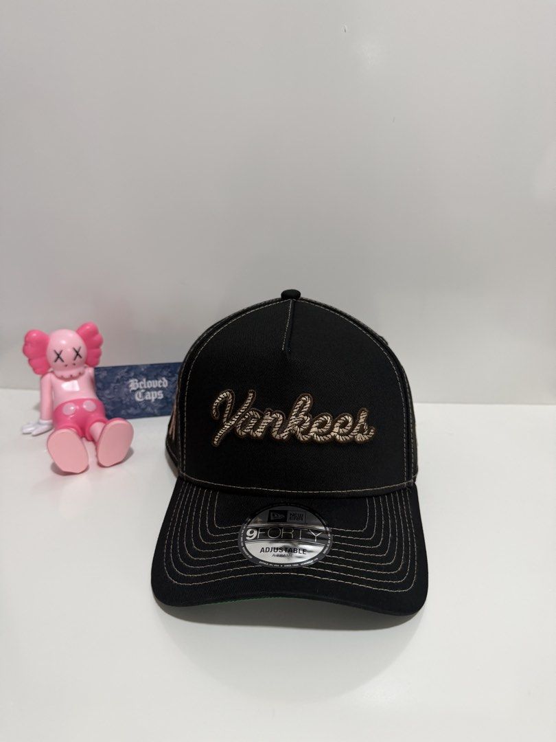 New Era New York Yankees Rope Script 9forty Aframe Snapback (Category: Caps & Hats) located in Valenzuela. Submitted by belovedcatdad (Listing ID 1462723022, Image 1). Description: - Brand New Era 9FORTY Yankees Cap - Color: Black - Features embroidered 'Yankees' script on the front - Yankees logo embroidered on the side - Adjustable strap at the back for a custom fit - Green underbrim - Ideal for any New York Yankees fan.