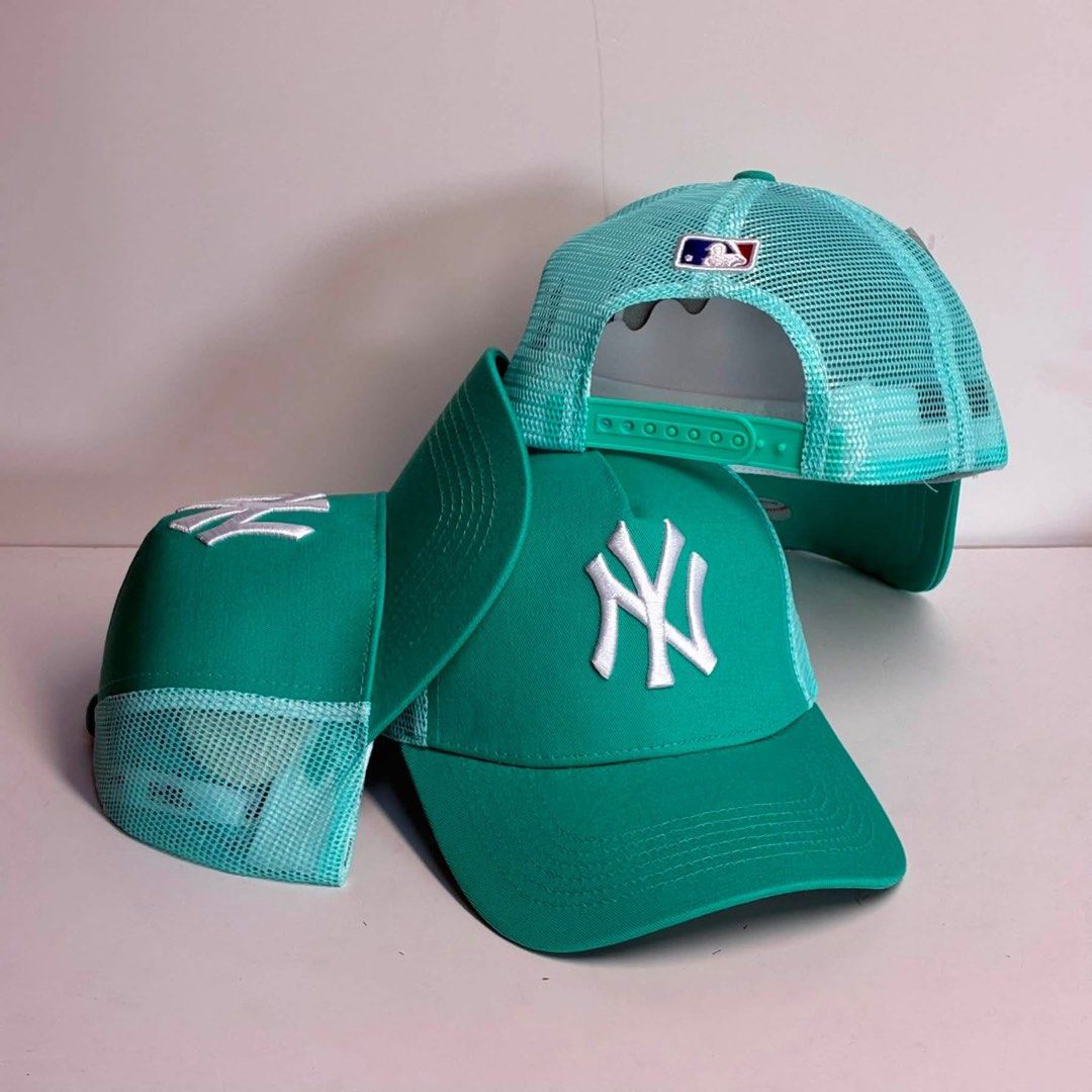 New York Yankees mesh trucker cap (Category: Caps & Hats) located in Bacoor. Submitted by snapgame (Listing ID 1462706376, Image 1). Description: New York Yankees mesh trucker cap with a white embroidered “NY” logo on the front.
