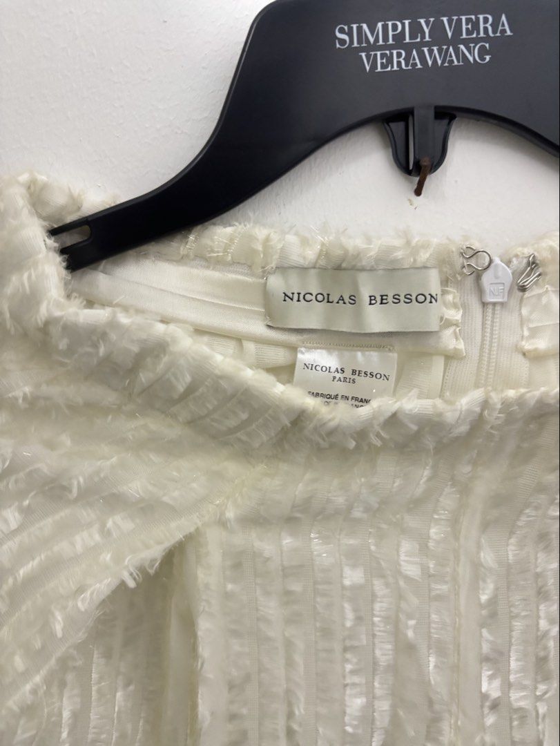 Nicolas Besson (Category: Luxury Apparel) located in Manila. Submitted by kingblaize (Listing ID 1462816335, Image 2). Description: These are a pair of cream-colored wide-leg trousers featuring a textured, fringed fabric with a subtle metallic sheen..