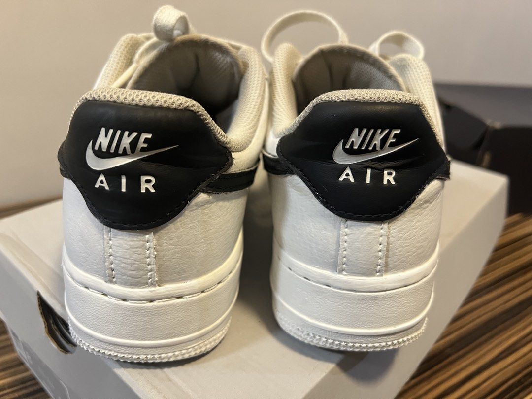 Nike Air Force 1 '07 White Black Sneakers (Category: Sneakers) located in Quezon City. Submitted by anna_rl23 (Listing ID 1462734294, Image 3). Description: - Classic white Nike Air Force 1 '07 sneakers - Features a black swoosh detail - Size: US Men's 8 / US Women's 9.5 - Includes original box.