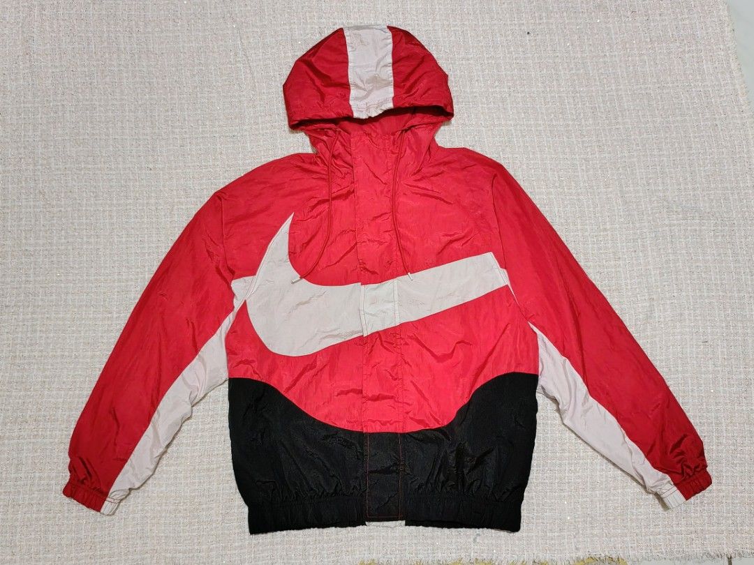 Nike Big Swoosh Windbreaker Jacket Red (Category: Coats, Jackets and Outerwear) located in Dagupan City. Submitted by luckylion_06c3bd (Listing ID 1462775755, Image 1). Description: Big Swoosh Size: Medium on tag Condition: 9.5/10 Yours @2,000 location Dagupan city yes to hipping +SF.