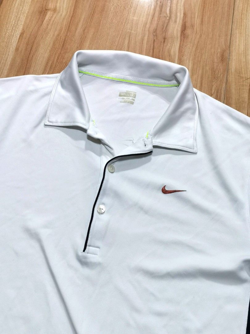 Nike Golf Dri-FIT polo (Category: Luxury Apparel) located in Angat. Submitted by kdthr1ft (Listing ID 1462798079, Image 2). Description: dimes: 21W 27.5L color rate: 10/10 white issue: bit of ink sa logo but not that noticeable.