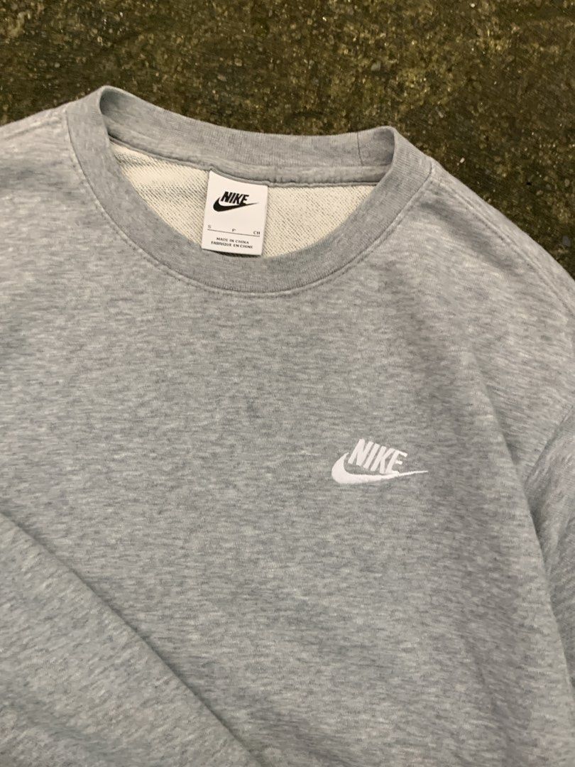 Nike Grey Crewneck Sweatshirt Size S (Category: Coats, Jackets and Outerwear) located in Manila. Submitted by thrift2mnla (Listing ID 1462812339, Image 3). Description: - Grey Nike crewneck sweatshirt - Small embroidered Nike logo on chest - Made in Indonesia - Tagged size S - Ideal for everyday wear - Please check photos for detailed condition.
