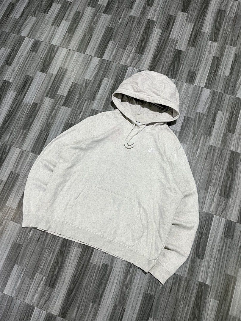 Nike Grey Pullover Hoodie Sweatshirt (Category: Coats, Jackets and Outerwear) located in Cavite. Submitted by arespichri90266 (Listing ID 1462699933, Image 1). Description: - Grey Nike Hoodie - Size XL (25x26) - Small embroidered Nike logo on chest - Drawstring hood - Front pocket - Ideal for everyday wear - issue: Minimal pink stain (not very visible) .
