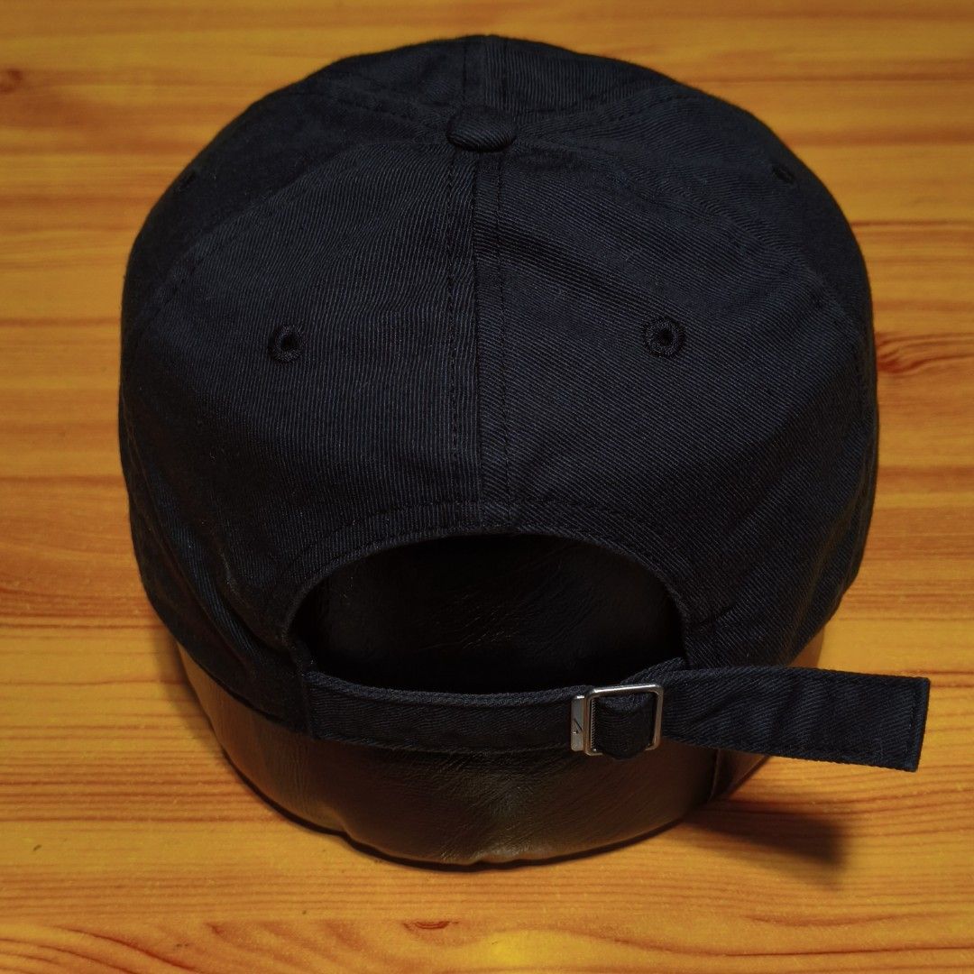 Nike Heritage86 Cap Black (Category: Caps & Hats) located in Manila. Submitted by caps08 (Listing ID 1462875455, Image 3). Description: - Classic black Nike cap - Iconic white embroidered Nike swoosh on front - Adjustable strap with metal buckle for a custom fit - Made with a comfortable cotton blend - Ideal for everyday wear or sports activities.