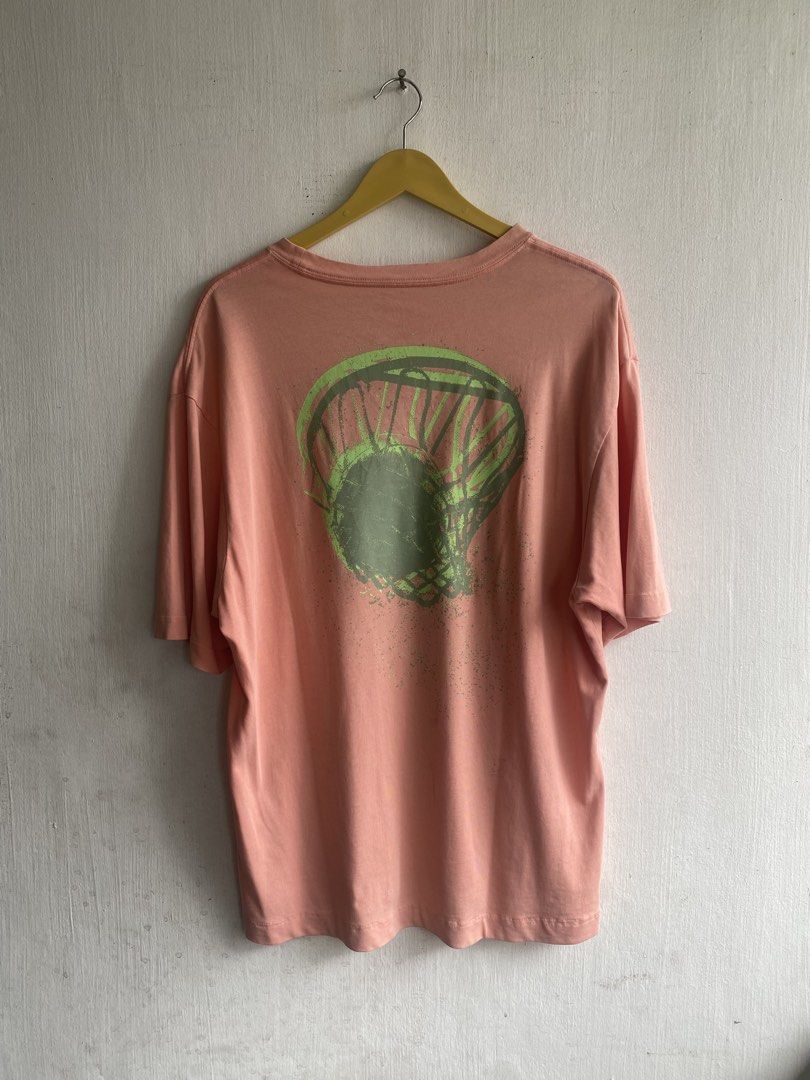 Nike Jordan Flight Graphic T-Shirt (Category: Tshirts & Polo Shirts ) located in Manila. Submitted by anthony1723 (Listing ID 1462716199, Image 3). Description: - Peach colored Nike Jordan T-shirt - Features 'Nike Flight' graphic on the front - Basketball hoop graphic on the back - Size: Medium (M) - Ideal for casual everyday wear.
