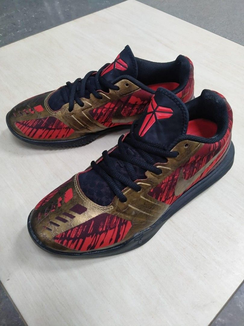 Nike KB Mentality 'Black Gold Red' Sneakers (Category: Sneakers) located in Rizal. Submitted by youngwolf-5f02 (Listing ID 1462799566, Image 2). Description: - Nike KB Mentality Basketball Shoes - Colorway: Black Gold Red - Size: US Men's 7 - Ideal for basketball or casual wear - Shows some signs of wear on soles and upper (please check photos for details).