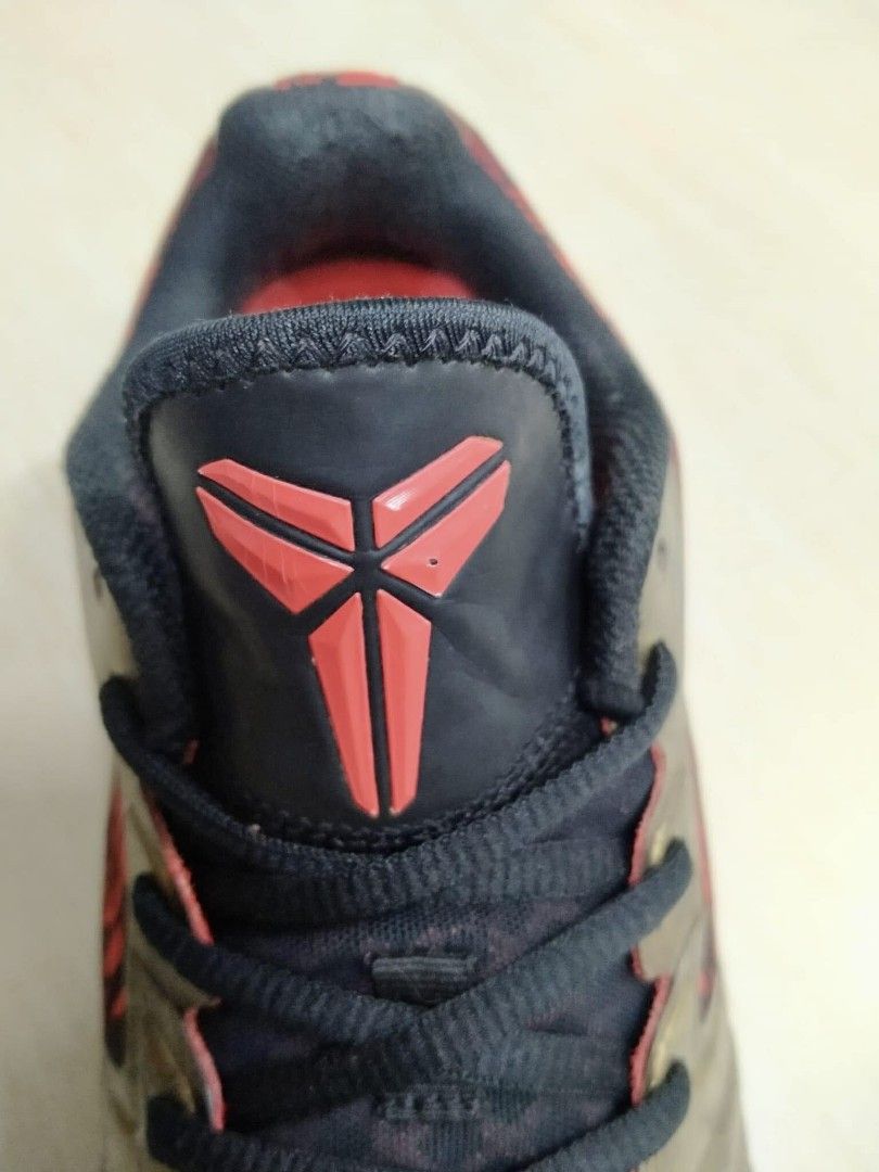 Nike KB Mentality 'Black Gold Red' Sneakers (Category: Sneakers) located in Rizal. Submitted by youngwolf-5f02 (Listing ID 1462799566, Image 3). Description: - Nike KB Mentality Basketball Shoes - Colorway: Black Gold Red - Size: US Men's 7 - Ideal for basketball or casual wear - Shows some signs of wear on soles and upper (please check photos for details).