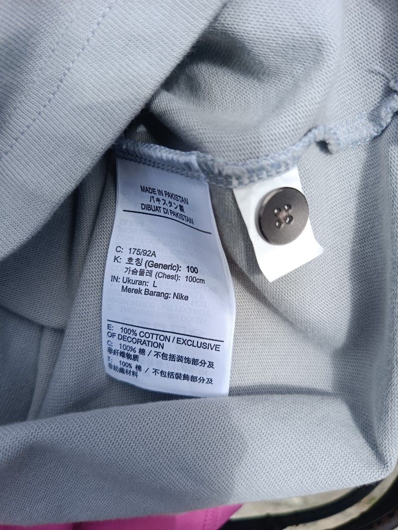 Nike Men's Grey Polo Shirt (Category: Tshirts & Polo Shirts ) located in Urdaneta. Submitted by tetsudoubletaps (Listing ID 1462739585, Image 3). Description: Fits L to XL 24 x 29 - Grey Nike Polo Shirt - Size: Large (L) on tag - Material: 100% Cotton - Origin: Made in Pakistan - Design: Simple, classic, perfect for casual or sporty looks - Features: Button closure at neck, embroidered Nike logo on chest.