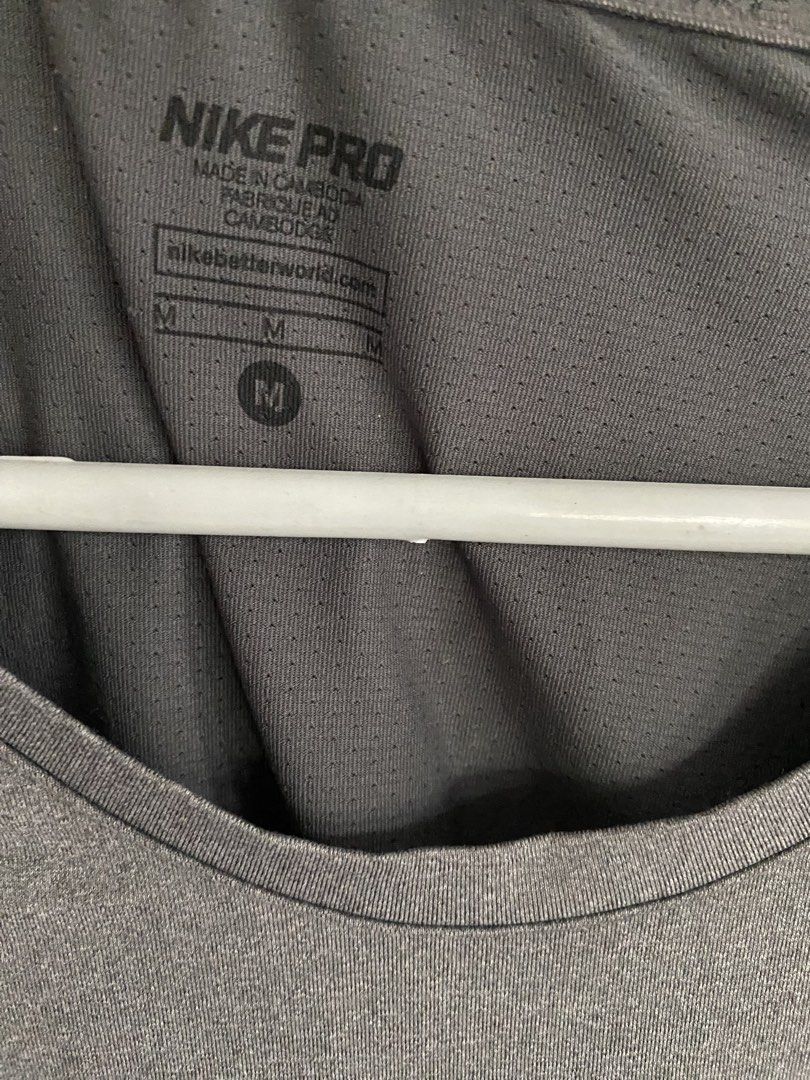 Nike Pro Dri-FIT Grey Training T-Shirt, medium (Category: Activewear) located in Paranaque City. Submitted by dessells_ (Listing ID 1462759479, Image 2). Description: - Grey Nike Pro Dri-FIT T-shirt - Size: Medium (M) - Short sleeves, crew neck design - Made in Cambodia - Ideal for workouts and everyday comfort - Features breathable and comfortable Dri-FIT material.