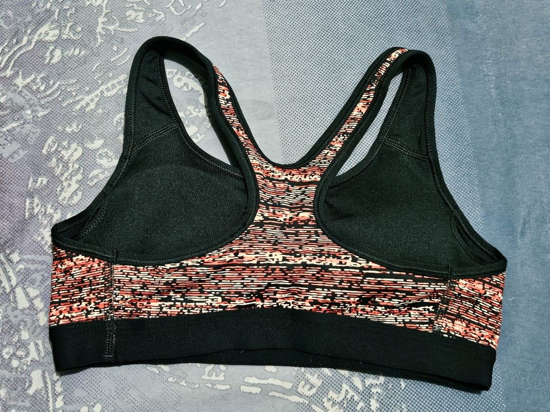 Nike Pro Sports Bra M Pink Black Pattern (Category: Activewear) located in Quezon City. Submitted by randzcruz (Listing ID 1462686261, Image 2). Description: Nike Pro Sports Bra (M) - Pink/Black Abstract. Supportive elastic band. Great for workouts & daily wear. Made in Sri Lanka..