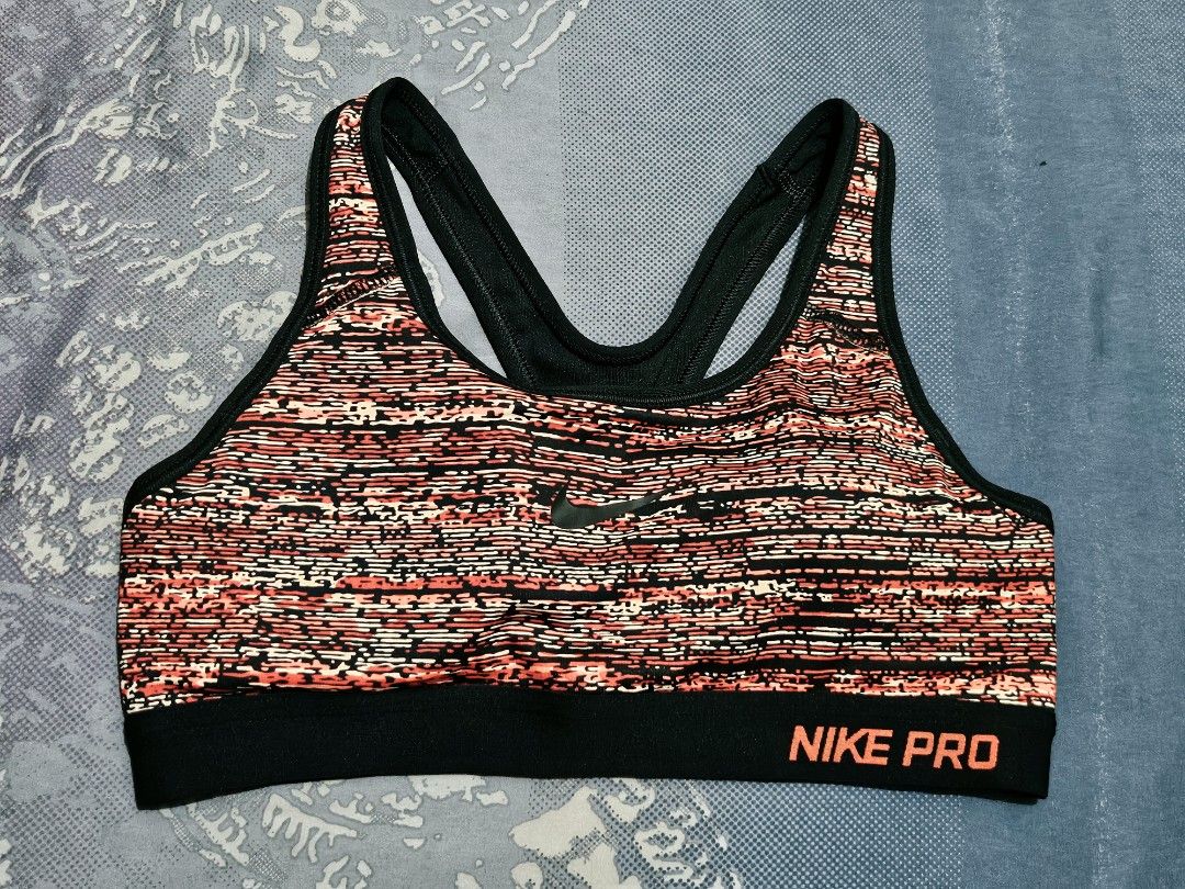 Nike Pro Sports Bra M Pink Black Pattern (Category: Activewear) located in Quezon City. Submitted by randzcruz (Listing ID 1462686261, Image 1). Description: Nike Pro Sports Bra (M) - Pink/Black Abstract. Supportive elastic band. Great for workouts & daily wear. Made in Sri Lanka..