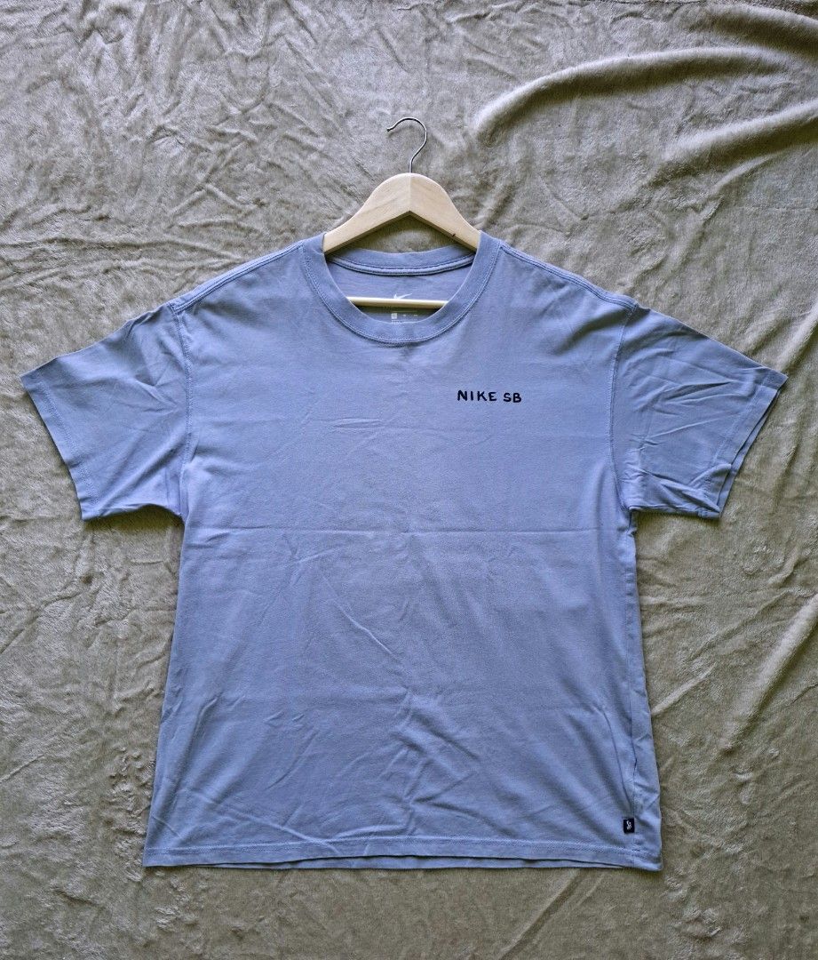 ​Nike SB Skate Pool Graphic Tee (Slate Blue / Periwinkle) (Category: Tshirts & Polo Shirts ) located in Alaminos. Submitted by made.by (Listing ID 1462859235, Image 1). Description: ​Chest Width: 21 in (Pit to Pit) Length: 27.5 in Tag Size: XL (Fits Regular Large to Slim XL based on measurements) Condition: Very Good Used Condition.