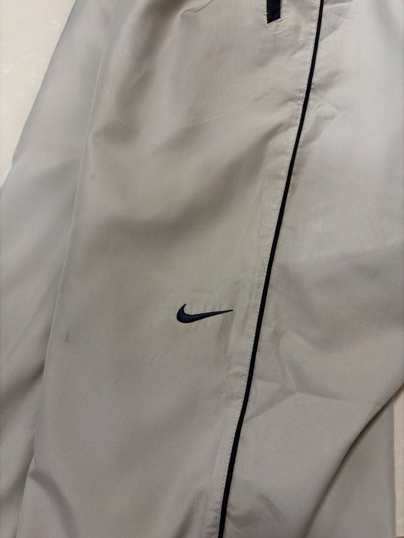 Nike Track Pants Grey L Zip Bottoms (Category: Joggers) located in Caloocan City. Submitted by puremountain.2e6573 (Listing ID 1462860906, Image 2). Description: - Grey Nike track pants - Size L (fits 150-160cm height) - Elastic waistband with drawstring - Full zip on the sides of the legs - Small Nike swoosh logo on the left leg - Made in China.