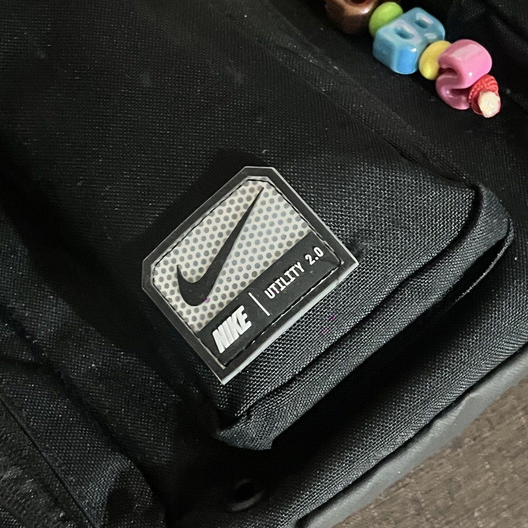 Nike Utility 2.0 Backpack Black (Category: Backpacks) located in Manila. Submitted by kimsunnycart (Listing ID 1462732894, Image 2). Description: - Black Nike Utility 2.0 backpack - Multiple pockets and compartments for excellent organization - Padded laptop sleeve inside - Adjustable padded straps for maximum comfort - Ideal for school, work, or travel - Includes cute keychains and pins - Ready for its next adventure! 6k orig price .