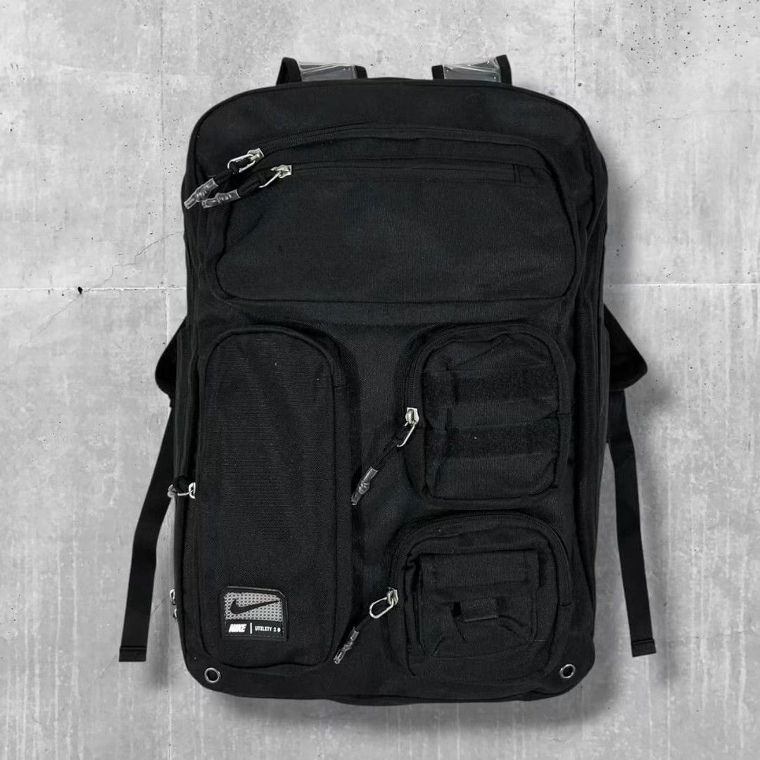 Nike Utility Speed Backpack Black (Category: Backpacks) located in Calbayog City. Submitted by thrift.bucks101 (Listing ID 1462839914, Image 1). Description: - Black Nike backpack - Multiple front pockets for organization - Padded straps for comfort - Main compartment opens wide - Durable material - Ideal for daily use or travel.