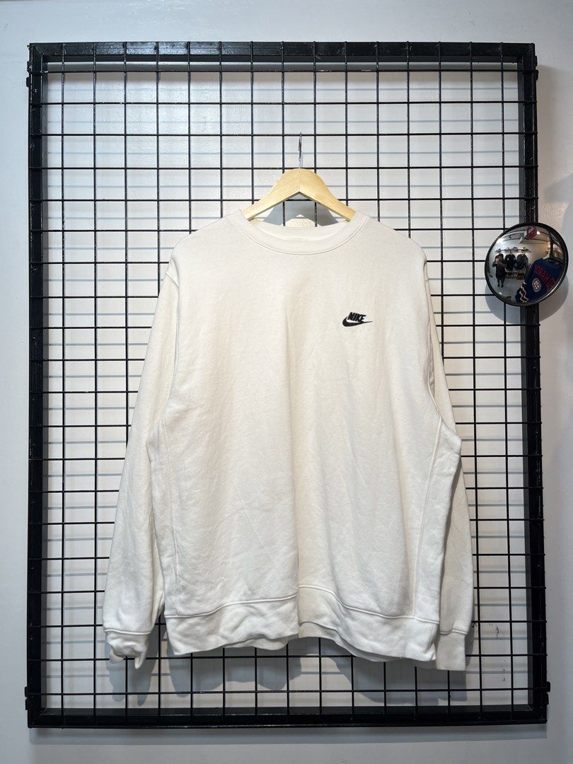 Nike White Crewneck Sweatshirt (Category: Coats, Jackets and Outerwear) located in Taal. Submitted by thrift_deals23 (Listing ID 1462788002, Image 1). Description: - White Nike crewneck sweatshirt - Small embroidered Nike logo on chest - Tag size: XL (TG, EG) - Made in Sri Lanka - Comfortable and classic wardrobe staple - Perfect for layering or standalone wear.