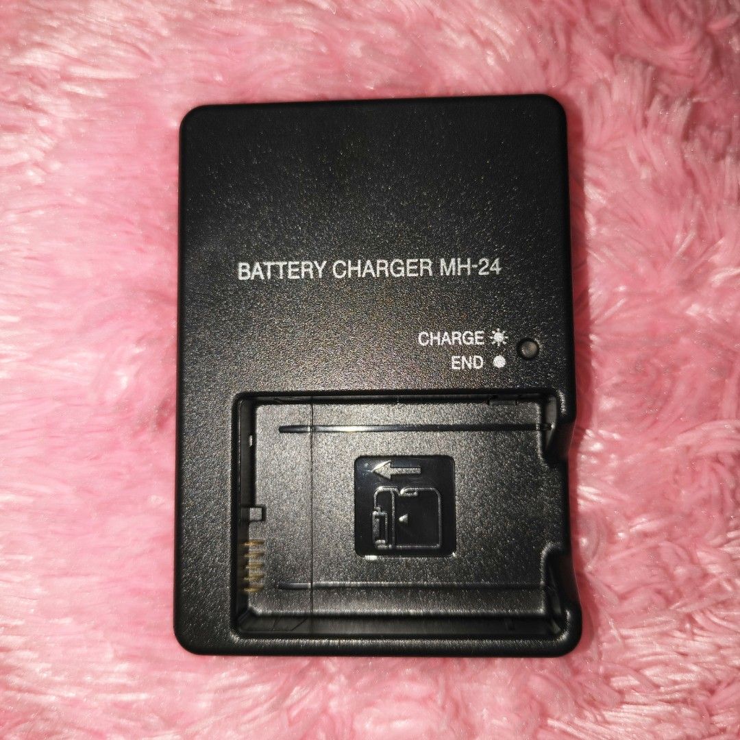 NIKON MH-24 Battery Charger (Category: Batteries & Chargers) located in San Fernando. Submitted by erryneh (Listing ID 1462834829, Image 1). Description: NIKON MH-24 CHARGER (battery for en-el14/14a) Buyer handles the delivery fee.