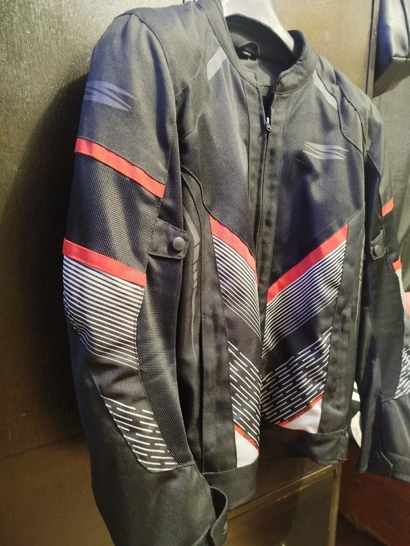 NITRO Riding Jacket JK-40 Waterproof (Category: Coats, Jackets and Outerwear) located in Manila. Submitted by jewelmom (Listing ID 1462813845, Image 2). Description: - NITRO Riding Jacket JK-40 - Color: Black with red and white accents - Features a waterproof inner coat - Ideal for motorcycle riding - Please check photos for detailed condition.