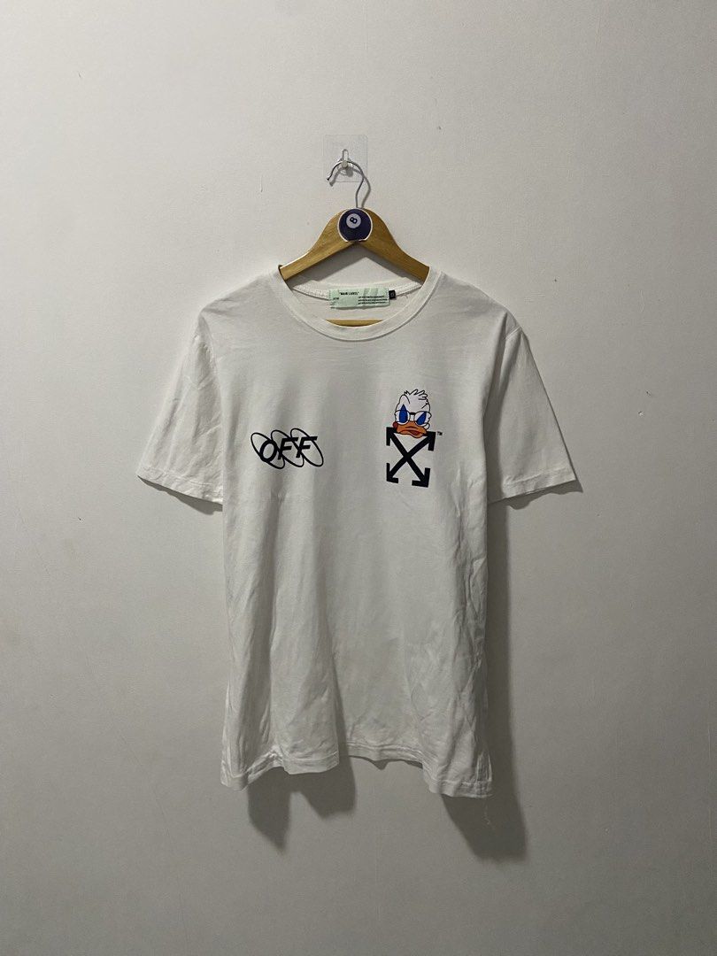 Off white (Category: Formal Shirts) located in Tagum. Submitted by thrift.tizz (Listing ID 1462804533, Image 1). Description: OFF WHITE X DONALD Excellent condition issue:dot stain removable see pics Size M-L 20.5x28.5 Colorate 9.3/10 .