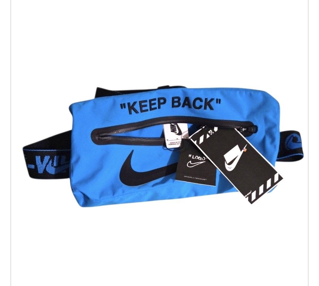 Off-white KEEP BACK belt Bag (Category: Luxury Bags & Wallets) located in Paranaque City. Submitted by calm_youngstore7 (Listing ID 1462812416, Image 3). Description: Nike x Off-White "KEEP BACK" Blue Nylon Belt Bag, a highly sought-after capsule piece originally released as an accessory alongside the NRG Jacket collaboratio. Key Details & Features Design Philosophy: Merges Nike’s functional sportswear aesthetic with Virgil Abloh's signature indu