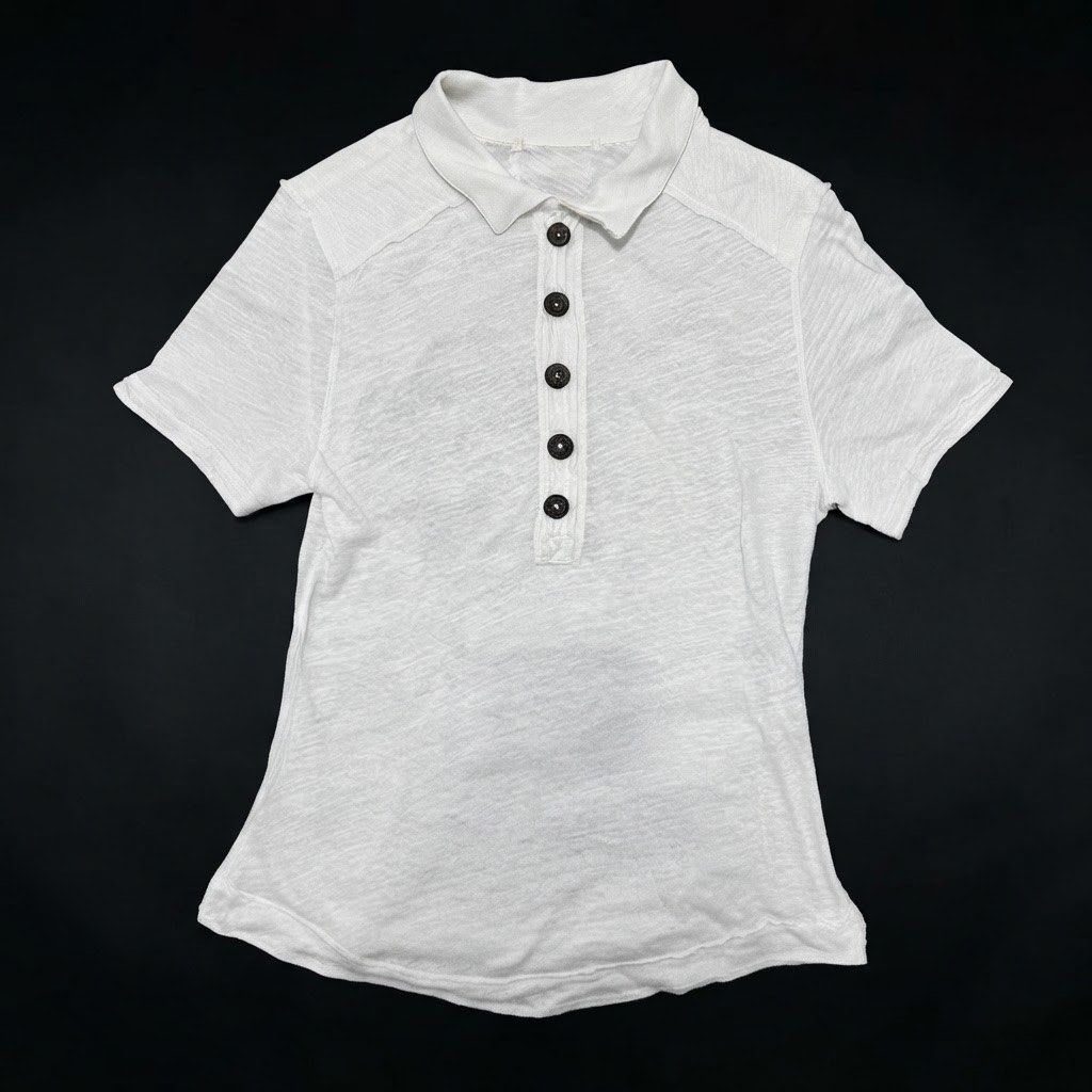 Off-White Short Sleeve Polo Shirt (Category: Shirts) located in Marikina City. Submitted by prelovedbydee. (Listing ID 1462878771, Image 1). Description: - lightweight - more off-white in person - dark brown buttons - slightly sheer (see 2nd pic) - can fit s-m (estimation only) can negotiate ☺️.