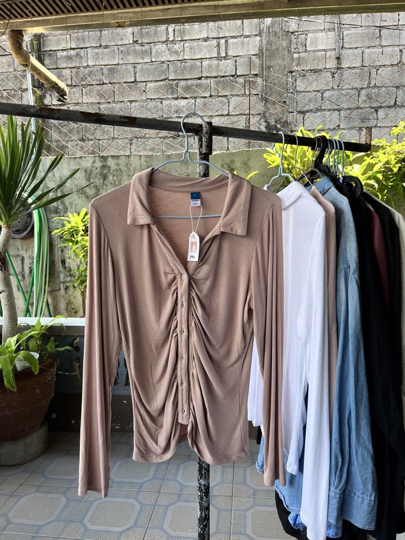 Old Navy Ribbed Pink Ruched Collared Long Sleeve (Category: Longsleeves) located in Dinalupihan. Submitted by penaflorcj (Listing ID 1462841262, Image 1). Description: - Pink ribbed long-sleeve top (also comes in white) -Collared neckline, button-up front, ruched detailing - Occasion: Perfect for casual wear or dressing up - Styling: Looks great with jeans or skirts rfs: decluttering *sale price + discount when you buy more than 2 items.