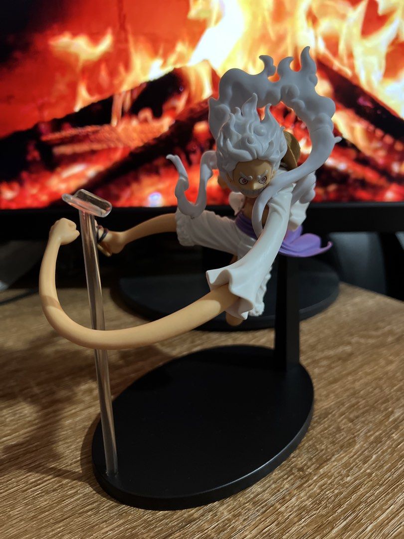 One Piece Monkey D. Luffy Gear 5 Figure (Category: Figurines & Statues) located in Davao. Submitted by ajonlineshop.24 (Listing ID 1462719449, Image 3). Description: - Awesome One Piece figure of Monkey D. Luffy in Gear 5 form. - Dynamic pose with swirling white effects. - Highly detailed hair and clothing. - Perfect addition to any One Piece fan's collection. - Display stand included..