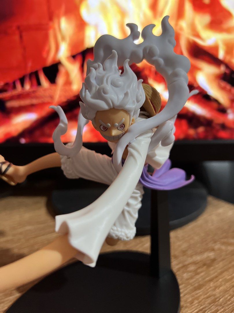 One Piece Monkey D. Luffy Gear 5 Figure (Category: Figurines & Statues) located in Davao. Submitted by ajonlineshop.24 (Listing ID 1462719449, Image 2). Description: - Awesome One Piece figure of Monkey D. Luffy in Gear 5 form. - Dynamic pose with swirling white effects. - Highly detailed hair and clothing. - Perfect addition to any One Piece fan's collection. - Display stand included..
