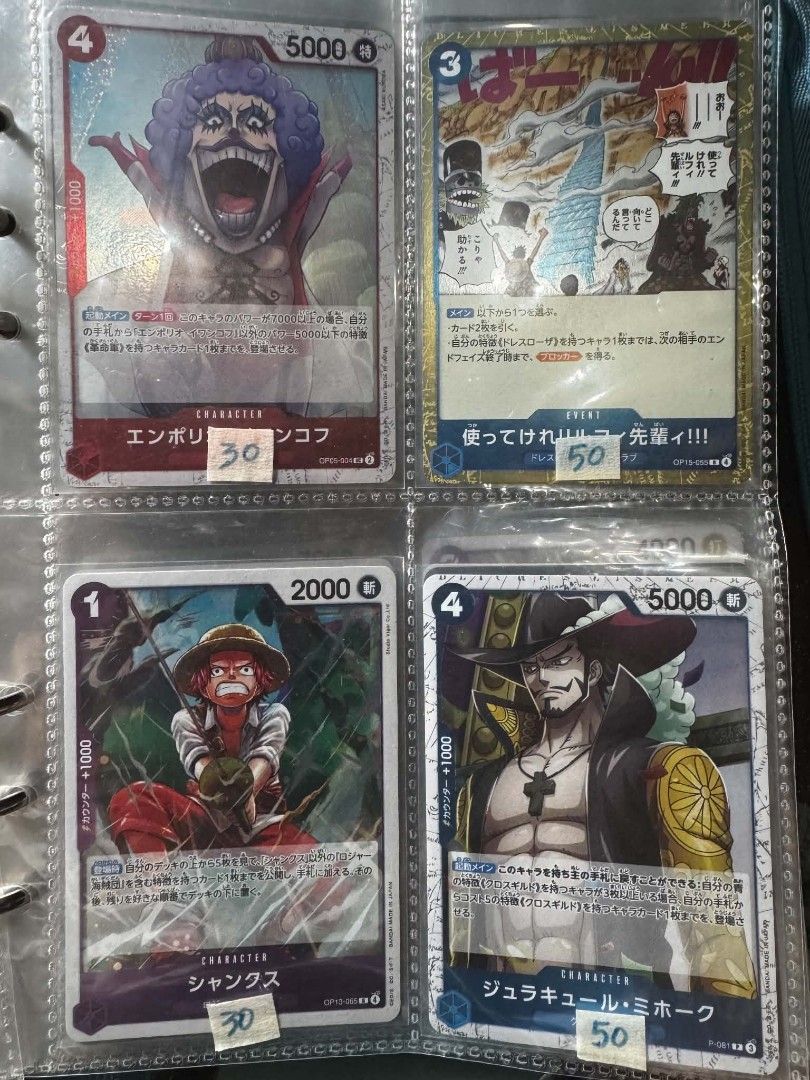 One Piece Trading Cards (Category: Raw Singles) located in Cavite. Submitted by the_stockpilers_corner (Listing ID 1462858148, Image 1). Description: Authentic One Piece trading cards - Assortment of cards from OP5-OP15 - All foil except for Zoro and Ms. Valentine - Sold as SET only - Card Condition: M-NM 📍 Palawan MoP: Gcash or Maya.