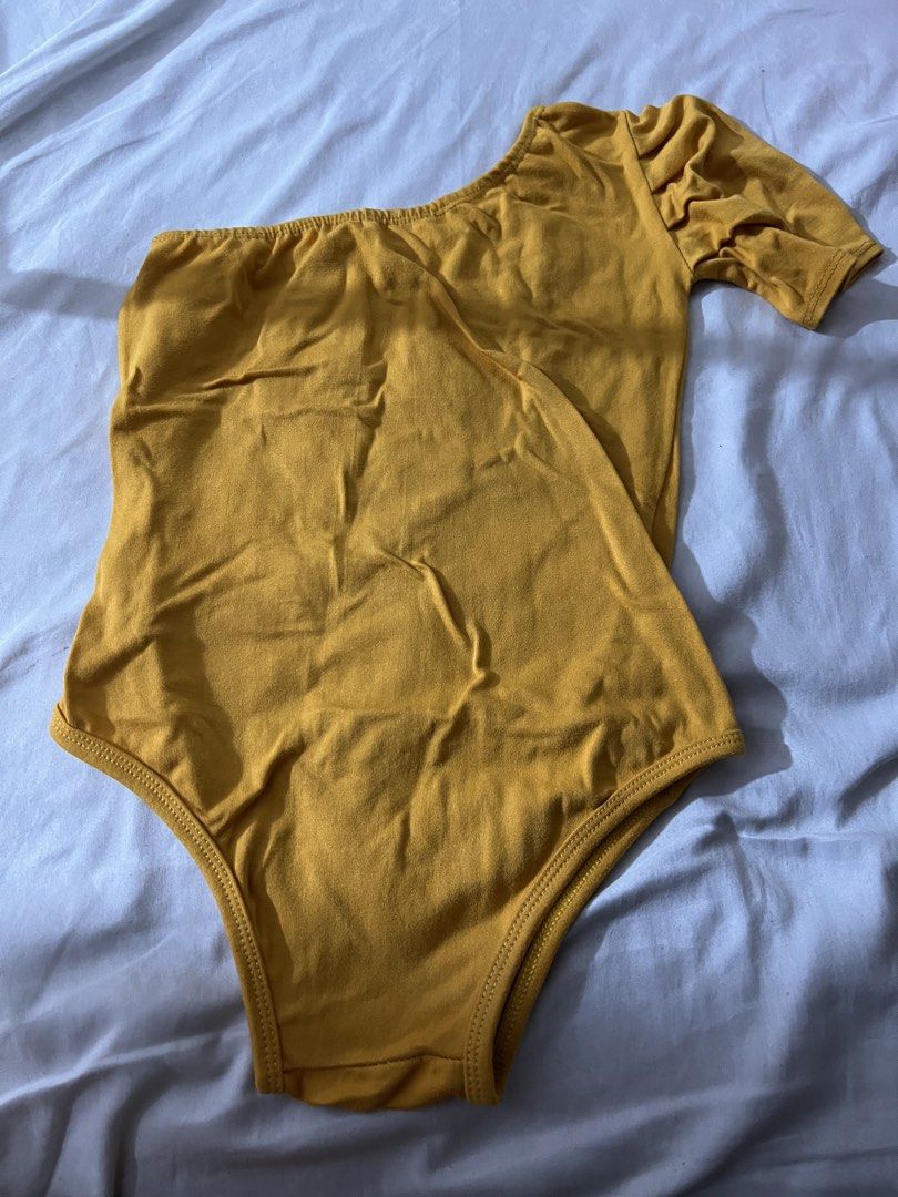 One shoulder short sleeve bodysuit (Category: Bikinis & Swimsuits) located in Paranaque City. Submitted by pilipinashop (Listing ID 1462821747, Image 2). Description: Used once for photoshoot Fit to small and medium No pads.