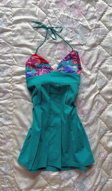 Onlyone Floral Emerald Halter Top XS-S (Category: Sleeveless) located in Manila. Submitted by clairebear09 (Listing ID 1462809873, Image 1). Description: - Emerald green halter dress - Features a floral print top - Ties at the neck for adjustable fit - Pleated skirt detail - Fits XS to S (bust up to 32cm) - Ideal for beach days or casual outings - RFS: Decluttering - got from ig shop TAGS: Fairy, Tropical, Sunset, Cami, Fairycore, Teal, Barbie, W